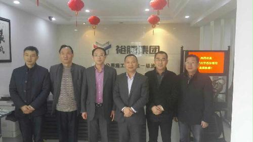 基金会拜访裕腾建设集团有限公司董事长周惠明1.jpg